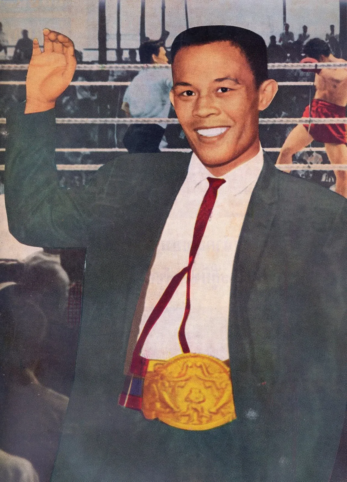 1965 - Apidej showing one of his seven title belts - the Oriental Boxing Federation welterweight championship belt.
